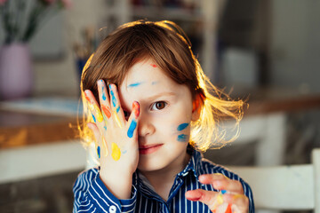 The concept of preschool education, painting, talent, happy family or parenting