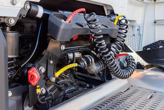 Truck air hoses to connect the air pressure to the semi-trailer, red for direct air and yellow for brakes.