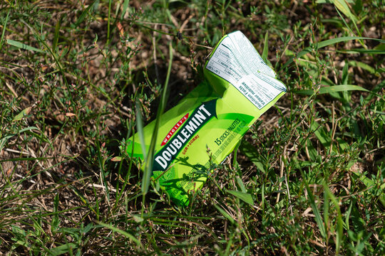 Doublemint chewing gum wrapper on the grass in the park