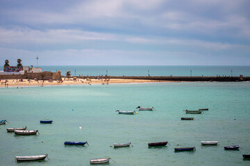 Boats on beach in Cadiz, Spain