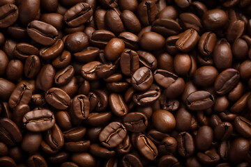 Obraz premium Background of roasted coffee beans. Seamless pattern.