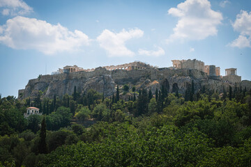 Fototapeta na wymiar Acropolis landmark in the top of a mountain in Athens, Greece
