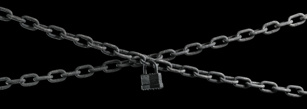 Worn rusted chain and pad lock on black background. Conceptual strength, protection, or security system.