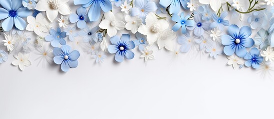 Blue and white spring flowers top view frame pattern copy space