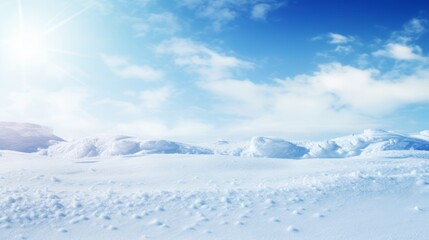 Fototapeta na wymiar Winter snow background with snowdrifts, with beautiful light and snow flakes on the blue sky ,16:9, copy space