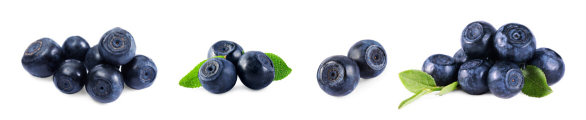 Set with tasty fresh bilberries and green leaves isolated on white