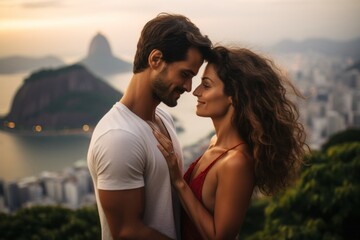 Couple in their 30s near the Christ the Redeemer in Rio de Janeiro Brazil