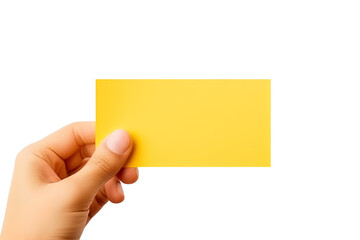 A human hand holding a blank sheet of yellow paper or card isolated on white background