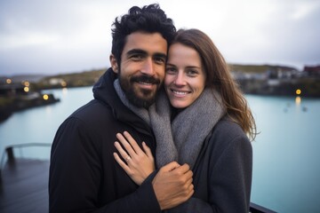 Couple in their 30s at the Blue Lagoon in Reykjavik Iceland - obrazy, fototapety, plakaty