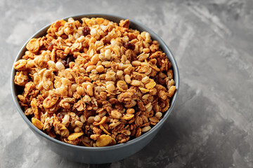 Homemade Granola in Bowl on Gray Concrete