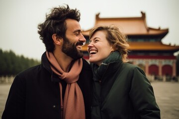 Naklejka premium Couple in their 30s smiling at the Mausoleum of the First Qin Emperor in Xian China