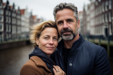A couple in their 40s at the Anne Frank House in Amsterdam Netherlands