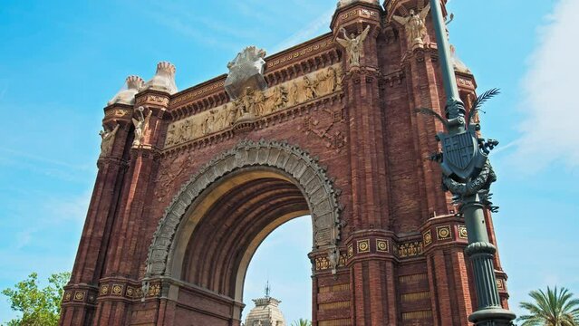 Close-up view of Arco de Triunfo de Barcelona in Spain. Beautiful Spanish architecture and design of The Arc de Triomf memorial arch serves as the main access gate in Spain Europe