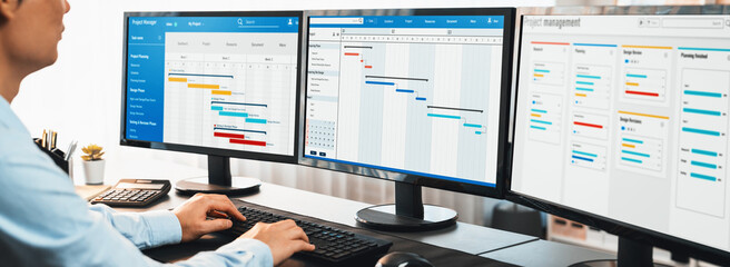 Project manager planning schedules for business task on office using gantt chart software display on screen. Modern business management and work flow organization. Trailblazing - obrazy, fototapety, plakaty