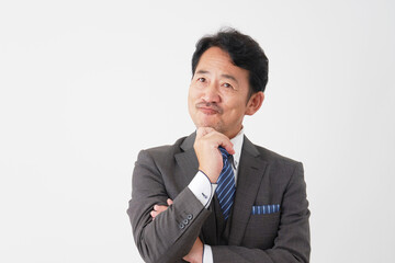 想像する中年のビジネスマン　白背景