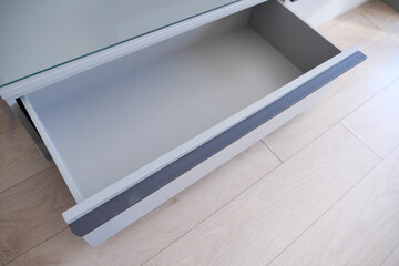 top view of a opened empty drawer 