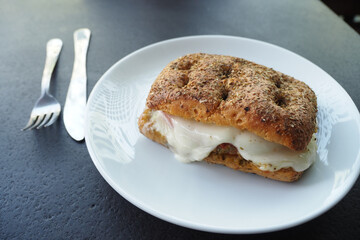 hamburger covered with melted cheese