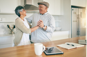 Old couple, dancing in kitchen and happy with retirement, partner and love with romance at home together. Dancer, support and trust with marriage and loyalty, man and woman in healthy relationship