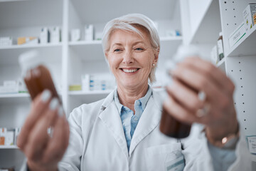 Happy senior woman, pharmacist and medicine for inventory inspection or checking stock on shelf at...