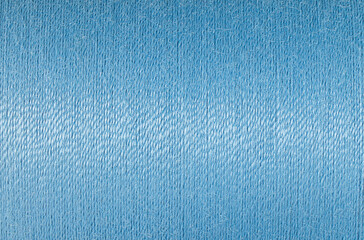 Abstract fabric texture background, close up picture of blue color thread, macro image of textile surface, wallpaper template for banner, website, poster, backdrop.