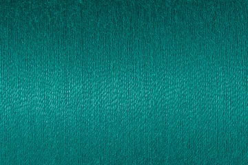 Cercles muraux Photographie macro Abstract fabric texture background, close up picture of verdigris green color thread, macro image of textile surface, wallpaper template for banner, website, poster, backdrop.