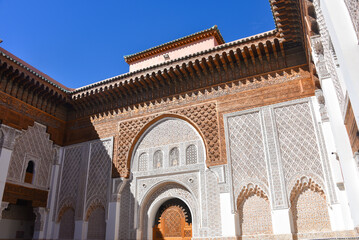 Marrakech, Morocco - Feb 10, 2023: Beautiful handicraft work inside the koranic school Medersa Ben...