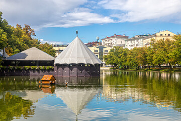 Chistye ponds with a large tent and a duck house in Moscow