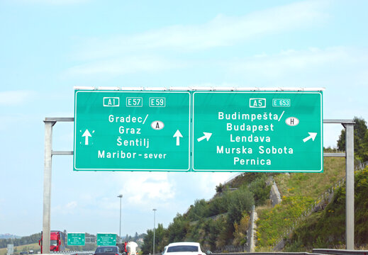 road sign with directions to the border of Austria and Hungary in central Europe