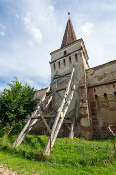 Tower and wooden support of a fortified Saxon church in the village of Moșna in Transylvania, Romania	