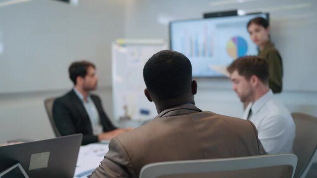 Serious team of businesspeople discussion and brainstom planning strategy corporate in meeting room. Group of businesspeople working together in boardroom at office. Business meeting concept
