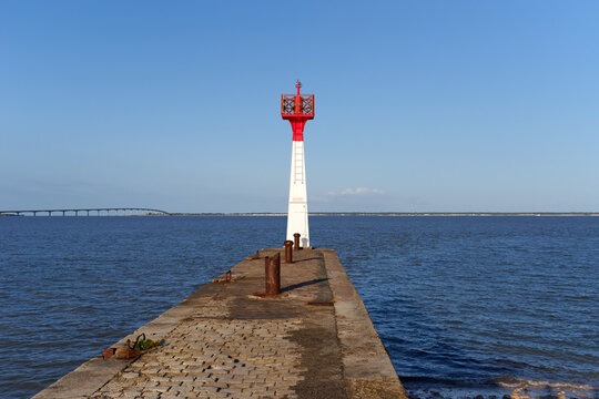 Lighthouse of the Plomb harbor and  The Ré bridge in the Charente Maritime coast
