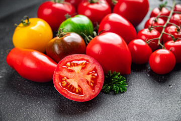 fresh tomato assorted tomatoes ripe fruit harvest type red, yellow, green vegetable meal food snack on the table copy space food background rustic top view