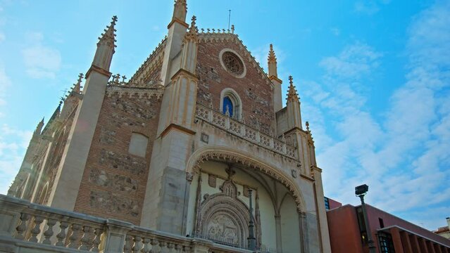 Early morning sun over San Jer&oacute;nimo el Real Monastery in Madrid City, Spain. European Geo-gothic sanctuary, stained glass and a baroque cloister in Spanish Capital Madrid