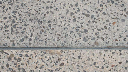 Texture of pavement of small stones and concrete