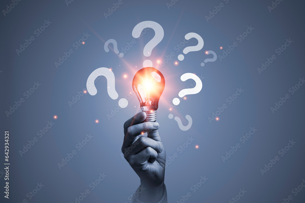 Poster hand holding glowing lightbulb with question mark for creative innovation idea and problem solution 
