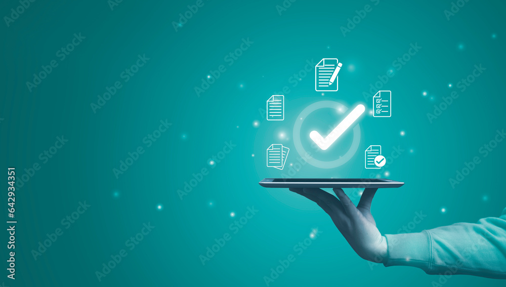 Poster Hand holding tablet with virtual document and mark correct sign for online approve  paperless and quality assurance concept.