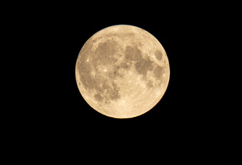 full moon over a black night