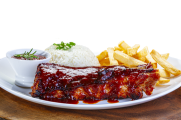 Pork ribs with barbecue sauce, french fries and rice