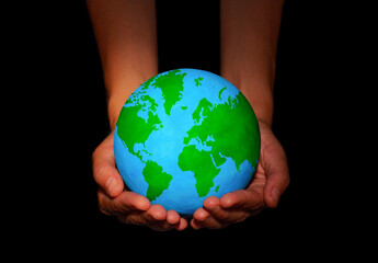 Verdant Globe in Hands on Black