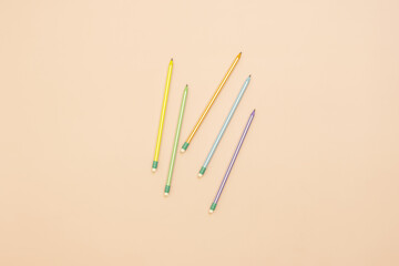 A few assorted colored graphite lead pencils