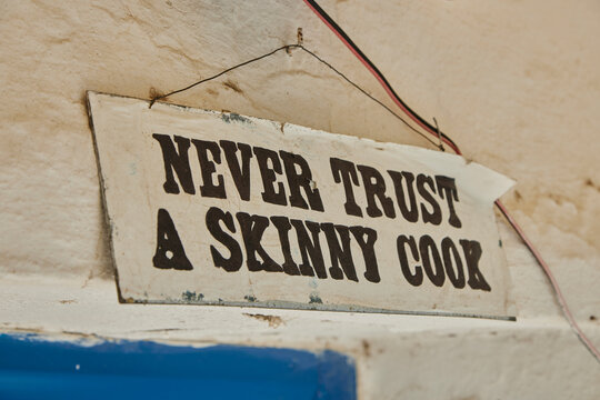 Sign. "Never trust a skinny cook." What would the world be without comedy?