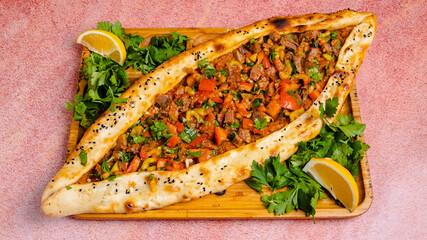 Turkish meat kushbashi pide top view isolated