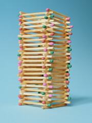 a tower built of multi-colored matches