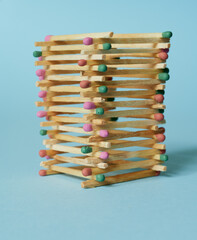 a tower built of multi-colored matches