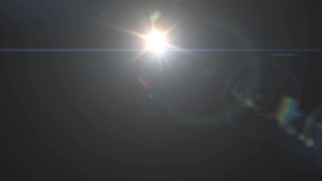Digital lens flare sun rays. Natural sun flare on the black. Overlays, overlay, light transition, effects sunlight, power lens flare with dust, light leaks . Center flickering star sun lights in 4k.