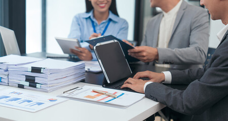 Asian business people teamwork strategy corporate meeting in progress, brainstorming ideas, leadership decision-making executives in conference boardroom, productive people engaged in problem-solving