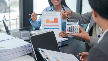 Asian business people teamwork strategy corporate meeting in progress, brainstorming ideas, leadership decision-making executives in conference boardroom, productive people engaged in problem-solving