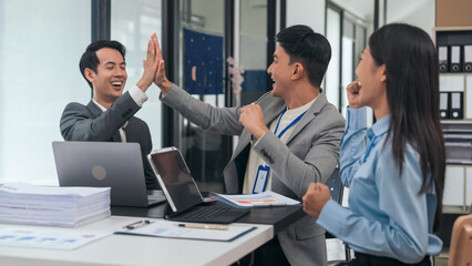 Asian business people teamwork strategy corporate meeting in progress, brainstorming ideas, leadership decision-making executives in conference boardroom, productive people engaged in problem-solving