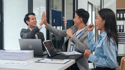 Asian business people teamwork strategy corporate meeting in progress, brainstorming ideas, leadership decision-making executives in conference boardroom, productive people engaged in problem-solving