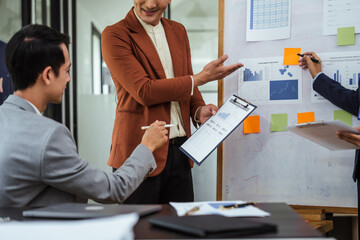 Opinion insights sharing organization meeting of Asian business people in meeting room, Constructive Feedback, Group Decision-Making, Strategic Planning, Diverse Perspectives, Contributing Ideas